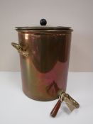 A copper water boiler with tap