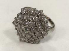 An 18ct gold diamond cluster ring, approximately 2.2 carat, 9.