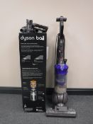A Dyson DC 41 ball vacuum,