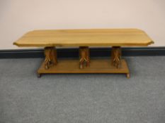 An Eastern coffee table on elephant supports