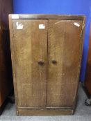 An oak double door record cabinet