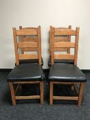 A set of eight pine ladder back dining chairs
