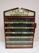An early 20th century F & J Smiths of Glasgow cigarette counter top display cabinet