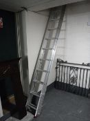 An aluminium eleven rung twin section extension ladder