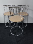 A set of three contemporary chrome bar stools