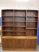 A Danish bookcase with cupboards beneath