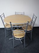 An Ikea circular kitchen table and four chairs