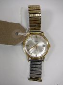 A gent's 18ct gold automatic calendar centre seconds wristwatch, signed Milex,