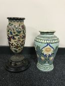 A twentieth century oriental polychrome crackle glaze vase with dragon and flower decoration on an