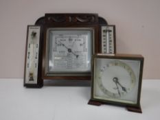 A carved oak barometer by Walker of Sunderland,