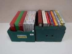 Two boxes of books including Haynes manuals, Viz annuals, Private Eye,