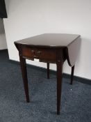 An inlaid mahogany strongbow flap sided table fitted a drawer