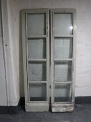 A pair of twentieth century glass panelled doors