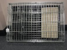 A folding metal pet cage