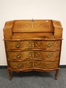 A good quality inlaid walnut serpentine fronted bureau,