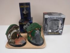 A tray containing two unboxed Lord Of the Rings No Admittance figures,