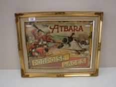 A gilt framed advertisement,