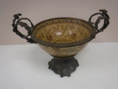 An ornate gilt metal and china twin handled fruit bowl