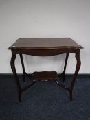 An Edwardian two tier occasional table