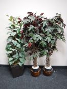 Three artificial plants in pots