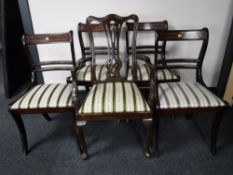 Four inlaid mahogany dining chairs and a carver armchair