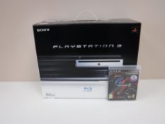 A boxed Sony Playstation 3 with game