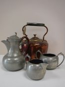 An antique copper kettle together with a three piece Abbey Pewter tea service