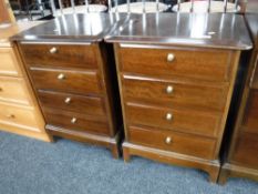A pair of Stag Minstrel four drawer bedside chests in a mahogany finish