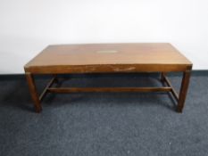A continental mahogany coffee table with brass mounts