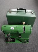 A metal cased Elna Super Matic sewing machine