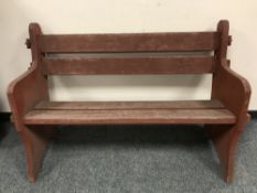 A painted pine two seater garden bench