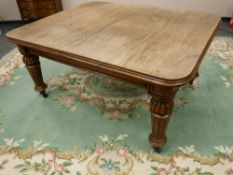An early Victorian mahogany extending dining table (no further leaves),
