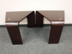A pair of contemporary triangular shaped tables