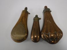 Three brass shot flasks
