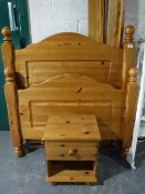 A 3' pine bed frame and a bedside stand