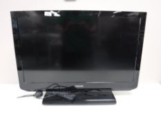 A Toshiba 32 inch LCD TV with remote
