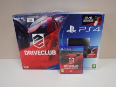 A boxed Sony Playstation 4 with game