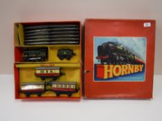 A boxed Hornby Meccano tin plate train set, including engine number 50153,