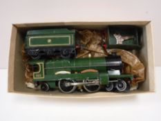 A mid twentieth century tin plate Caerphilly castle engine with two wagons and key