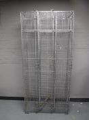 A wire mesh triple door locker