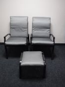 A pair of metal adjustable garden armchairs with cushions together with a stool