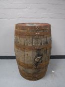 A coopered oak barrel