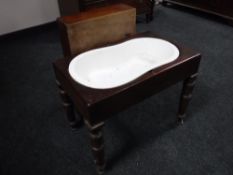 A Victorian mahogany child's bath table with liner