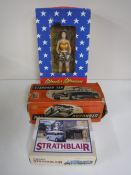 A boxed Wonder Woman Masterpiece Edition figure together with a Corgi Strathblair bus pack,