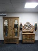 A satin wood double door mirrored wardrobe,