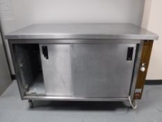 A stainless steel double door warming cabinet