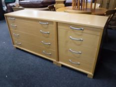 Two contemporary four drawer chests in a pine finish