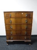 A walnut Queen Anne style five drawer chest with drop handles