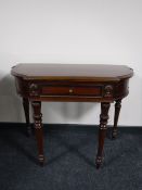 A mahogany Regency style hall table fitted a drawer