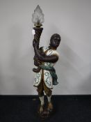 A Blackamoor style floor lamp